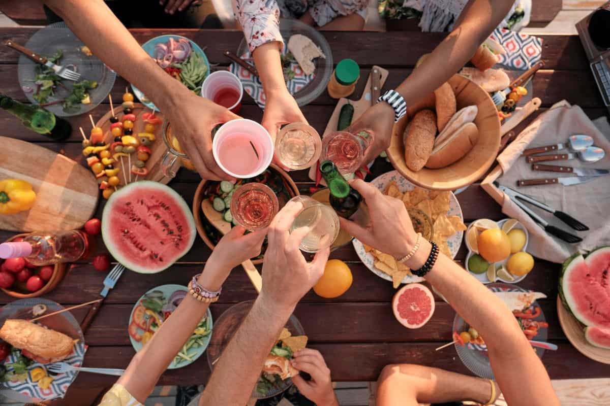friends with picnic spread https://www.canva.com/photos/MAEF43P9Jww/