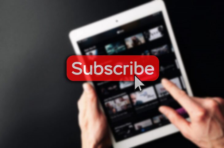 subscription service; red; subscription; service; button; video; online; internet; subscribe; arrow; computer; newsletter; tablet; blured; tv; laptop; movie; background; technology; digital; cursor; email; icon; like; vod; music; hand; hold; series; concept; person; software; marketing; stream; app; share; business; membership; home; channel; film; multimedia; hd; play; blur; svod; website; hulu; click; bell;